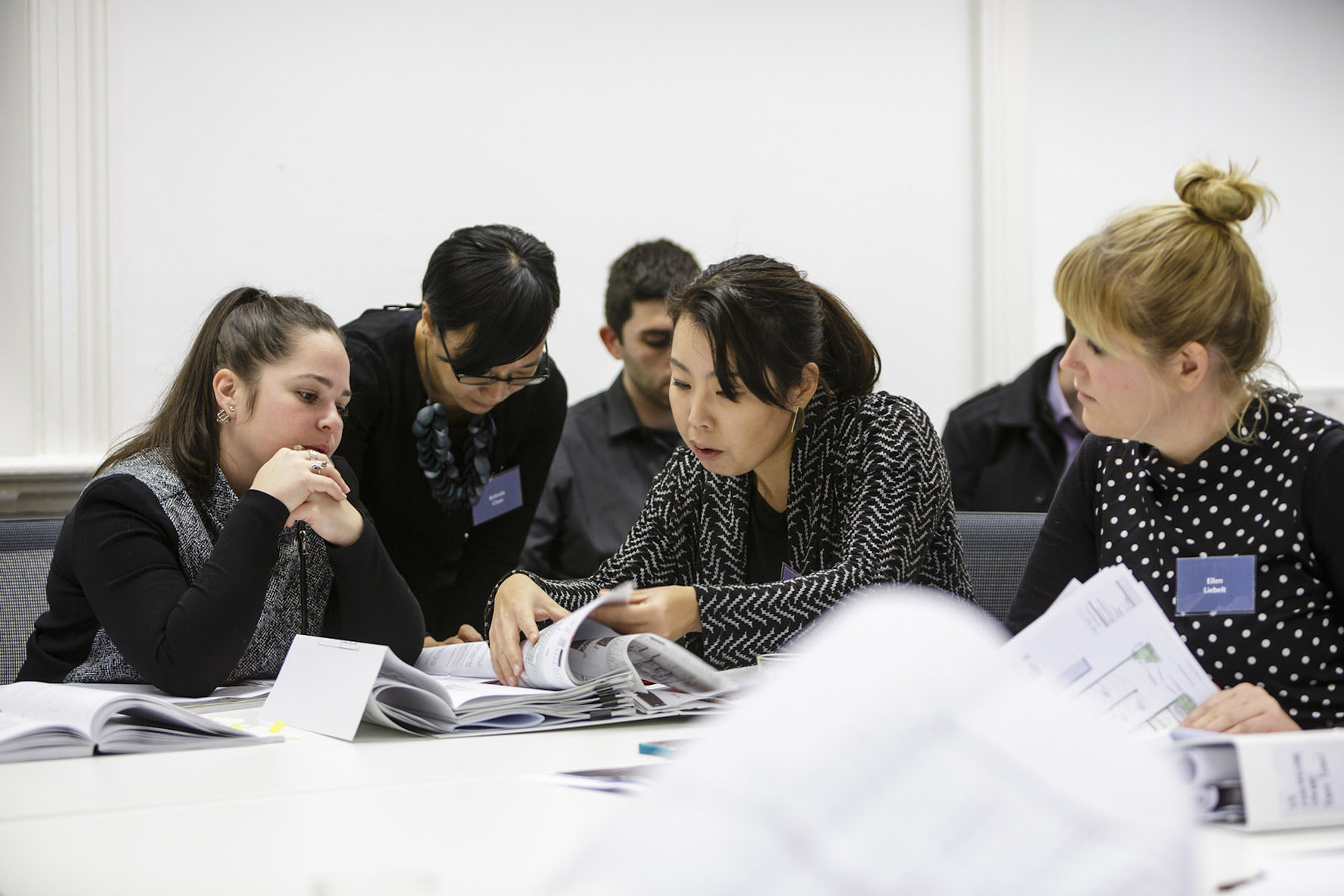 ODASA team members reviewing a set of drawings